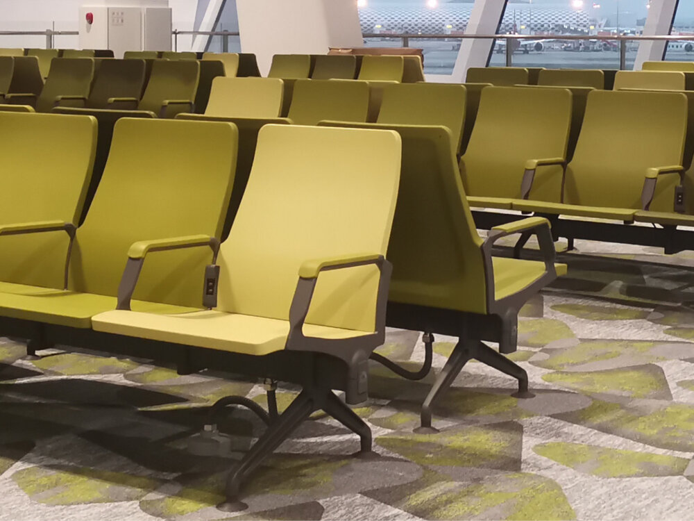 Airport bench seats with USB ports in terminal